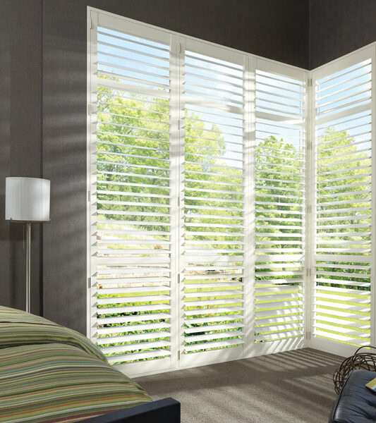white plantation shutters for corner windows Reno NV