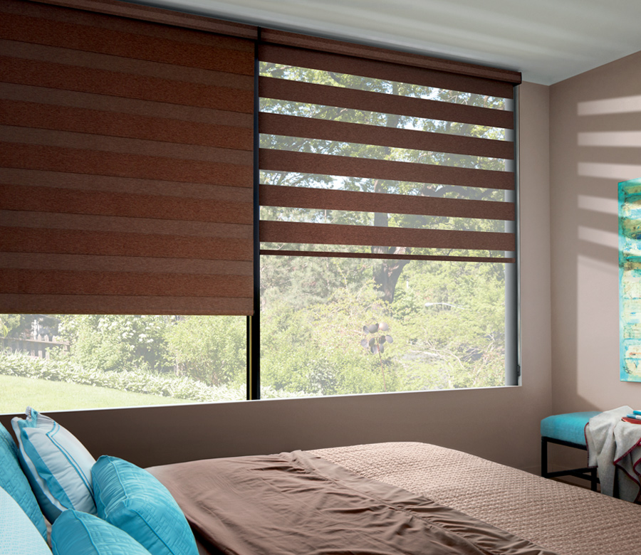 room darkening designer banded window roller shades in bedroom Reno NV