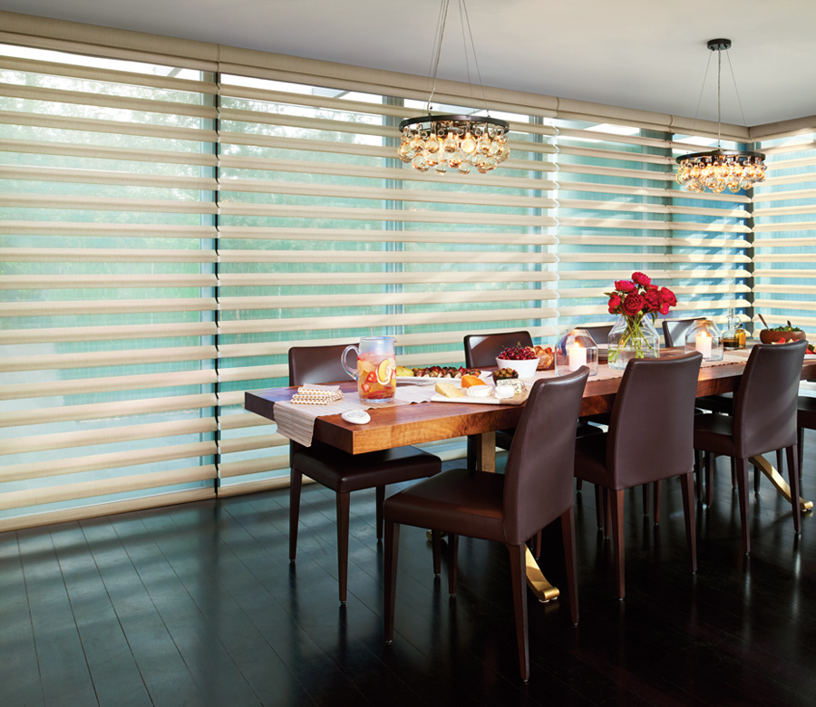 large windows with neutral pirouette shades Incline Village NV