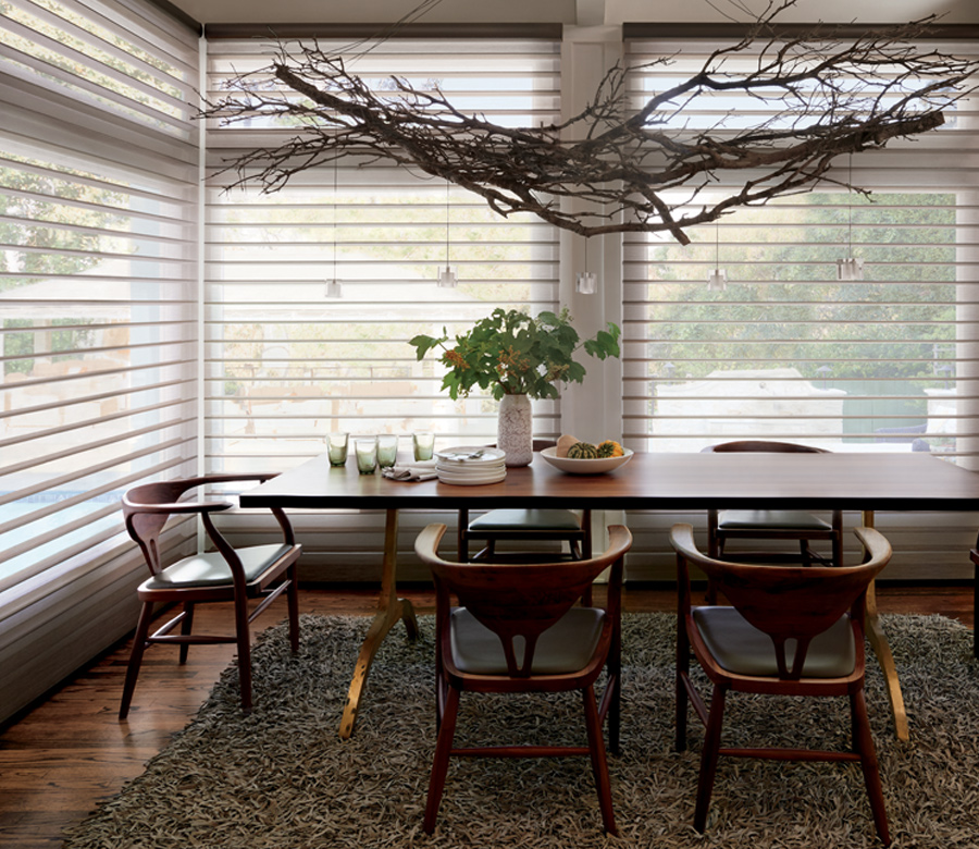 dining room with large windows and silhouette shades Reno NV
