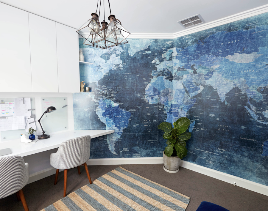 blue world map wall mural in home office design