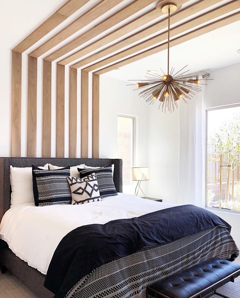 Focal light fixture in master bedroom.