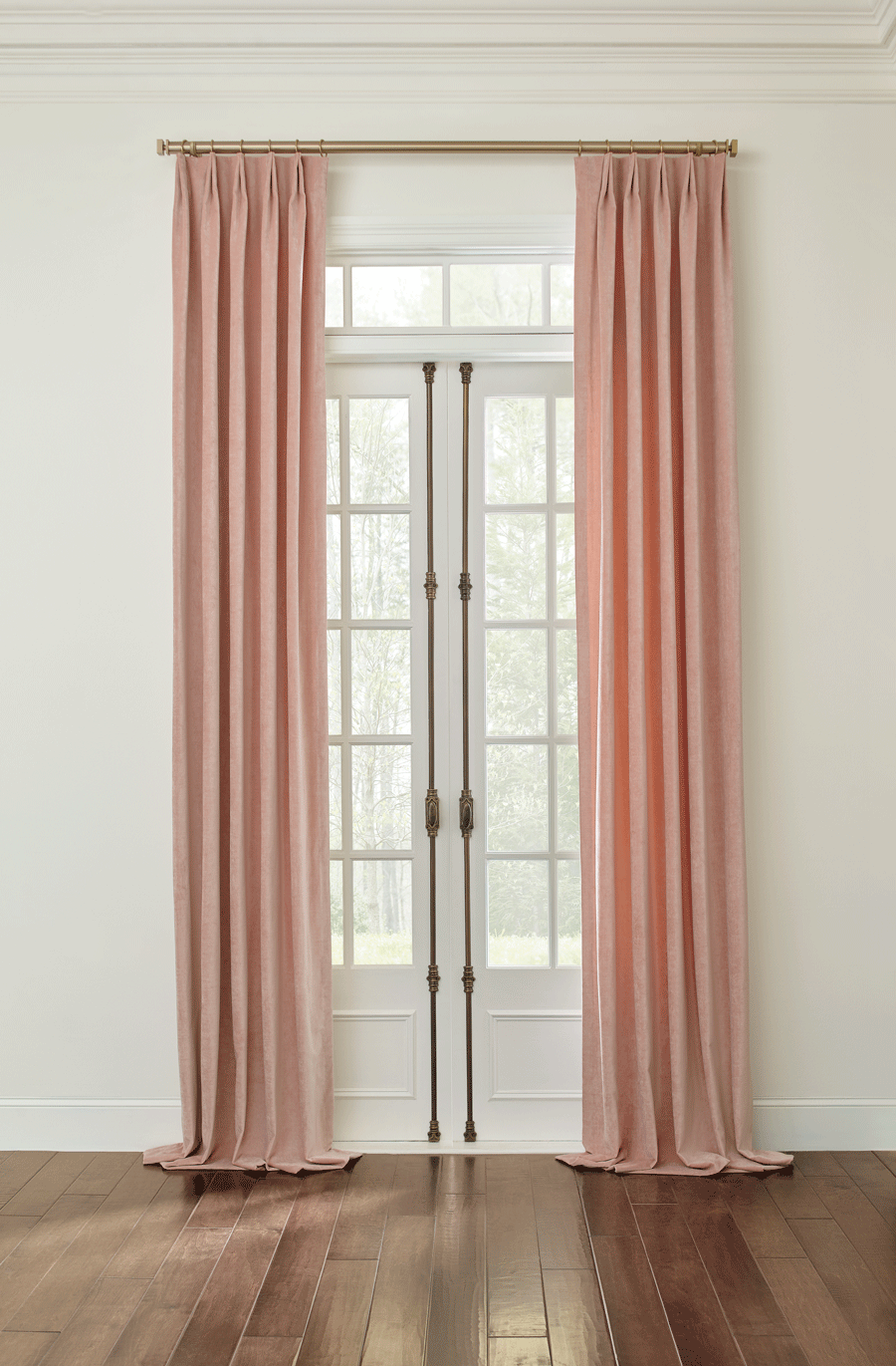 puddled pink drapery panels cover French doors