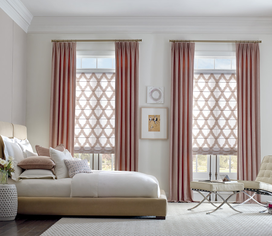 pinch pleat drapery panels with trellis pattern roman shades Incline Village, NV