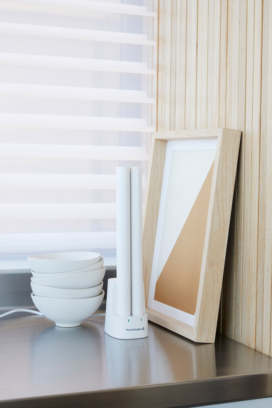PowerView® rechargeable battery wand placed in charging station