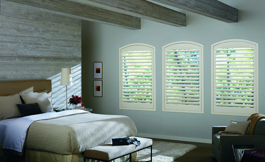 Bedroom arched windows with shutters