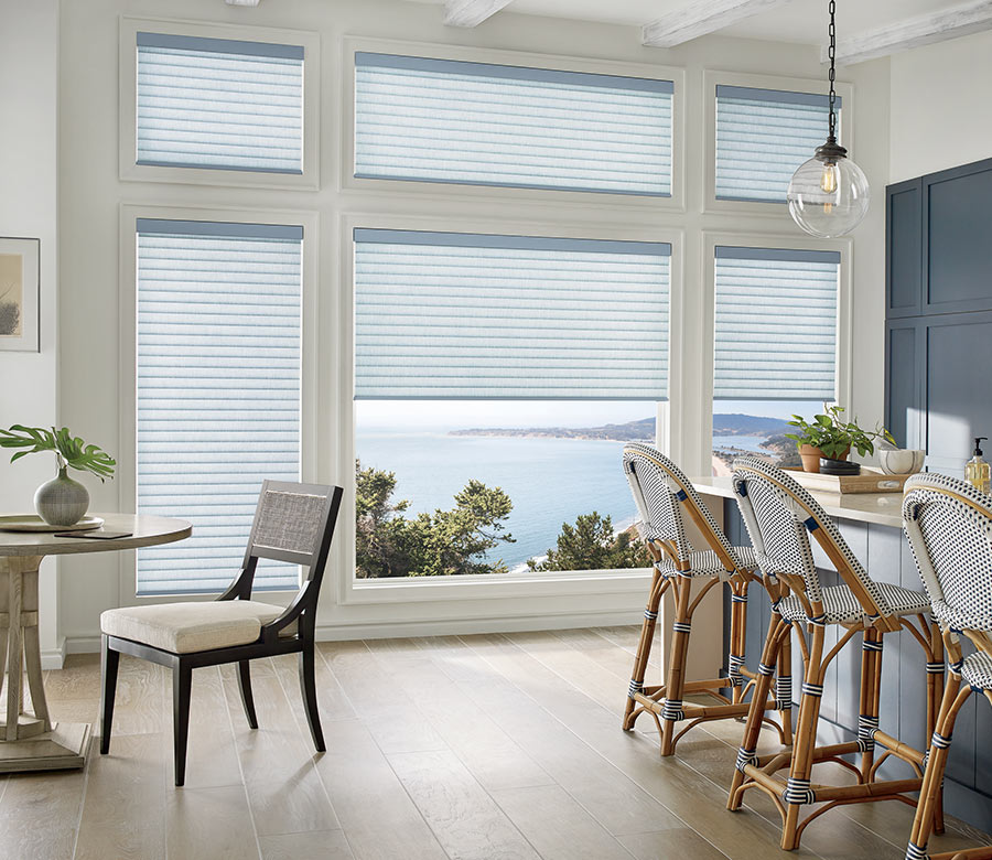 blue kitchen designed with light blue cellular roller shades in Reno NV