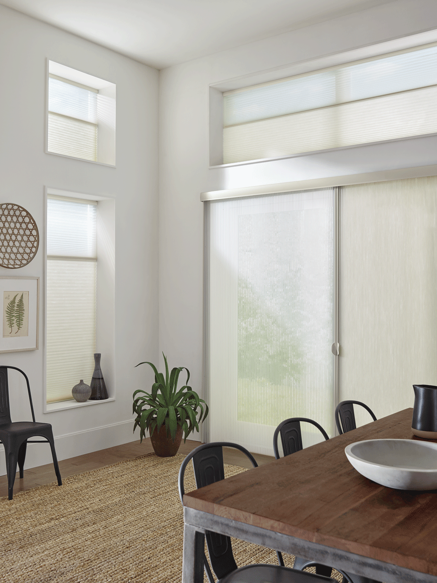 vertical honeycomb shades on sliding glass doors for light filtering and energy efficiency in Reno NV
