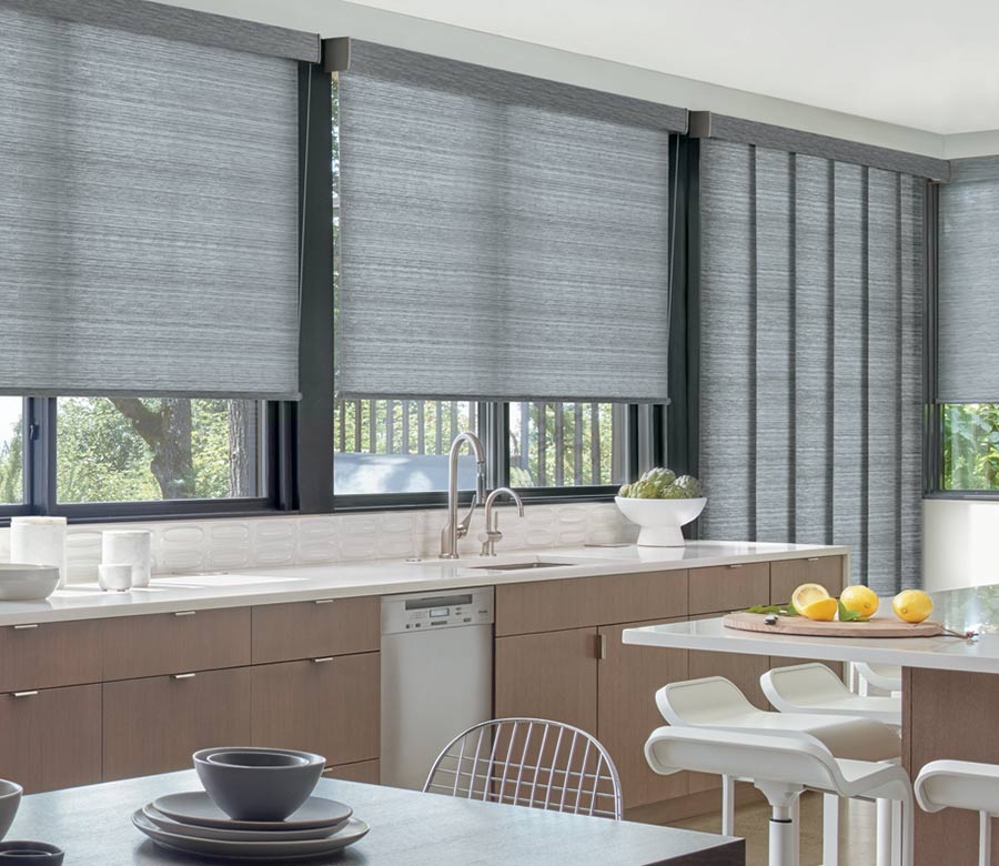 gray roller shades with vertical panel track blinds in Reno NV kitchen