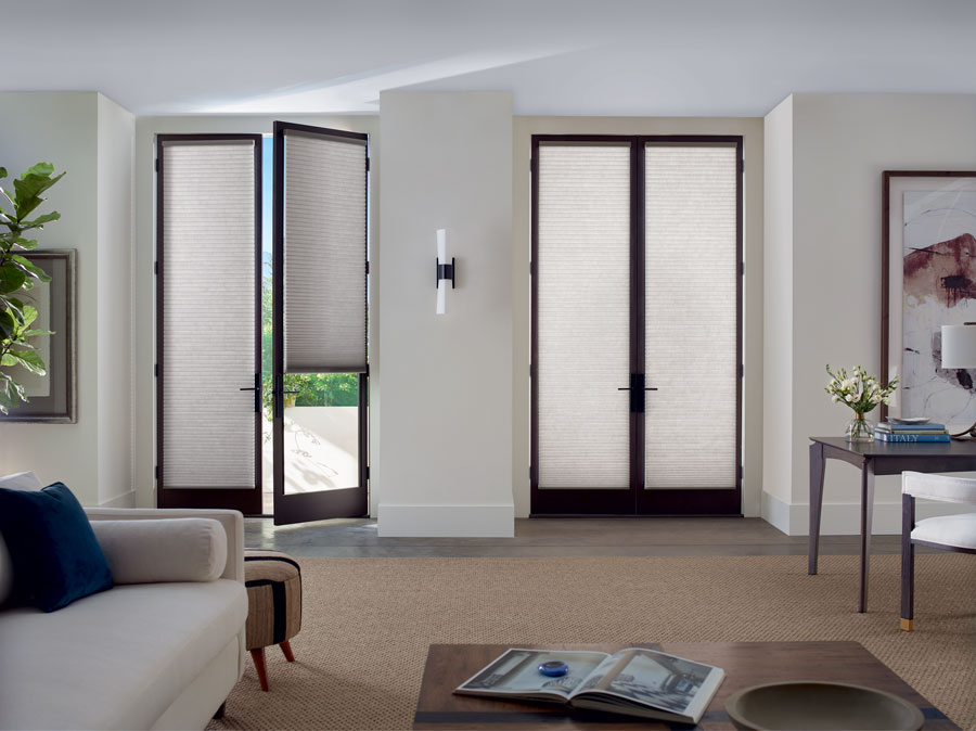 wooden french doors with white cellular shades with trackglide system in Reno NV