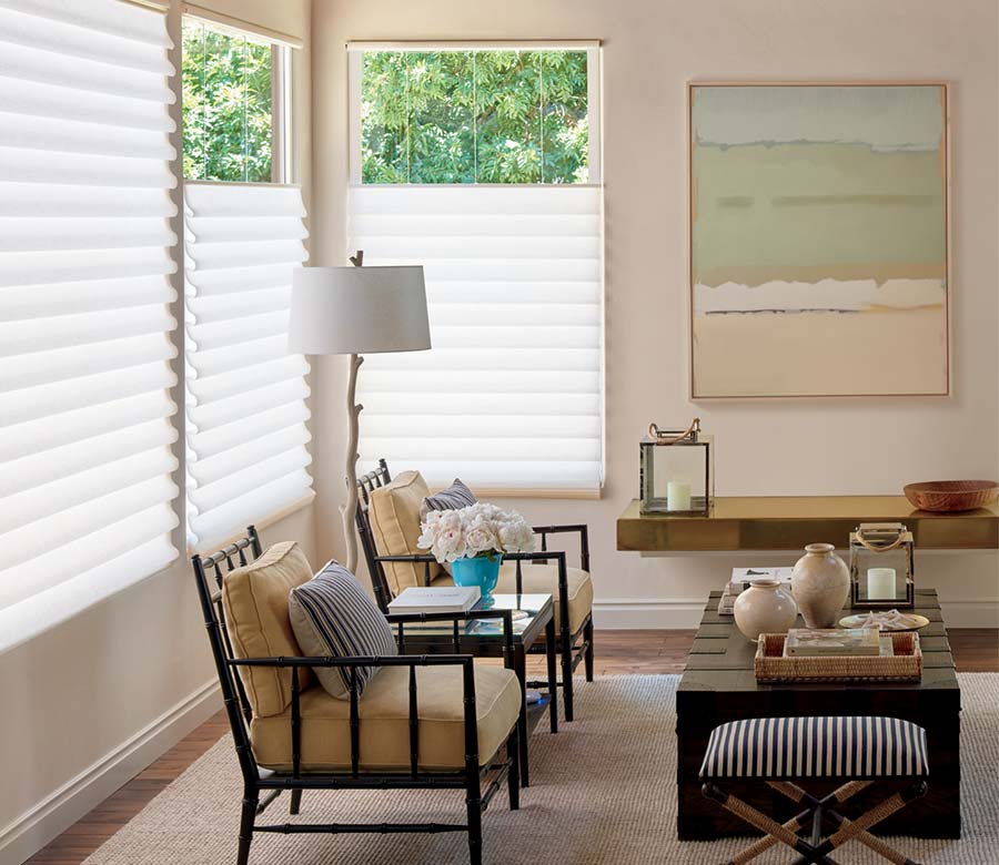 rustic beige living room with white roman shades