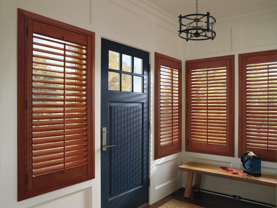 Interior shutters in entryway of home