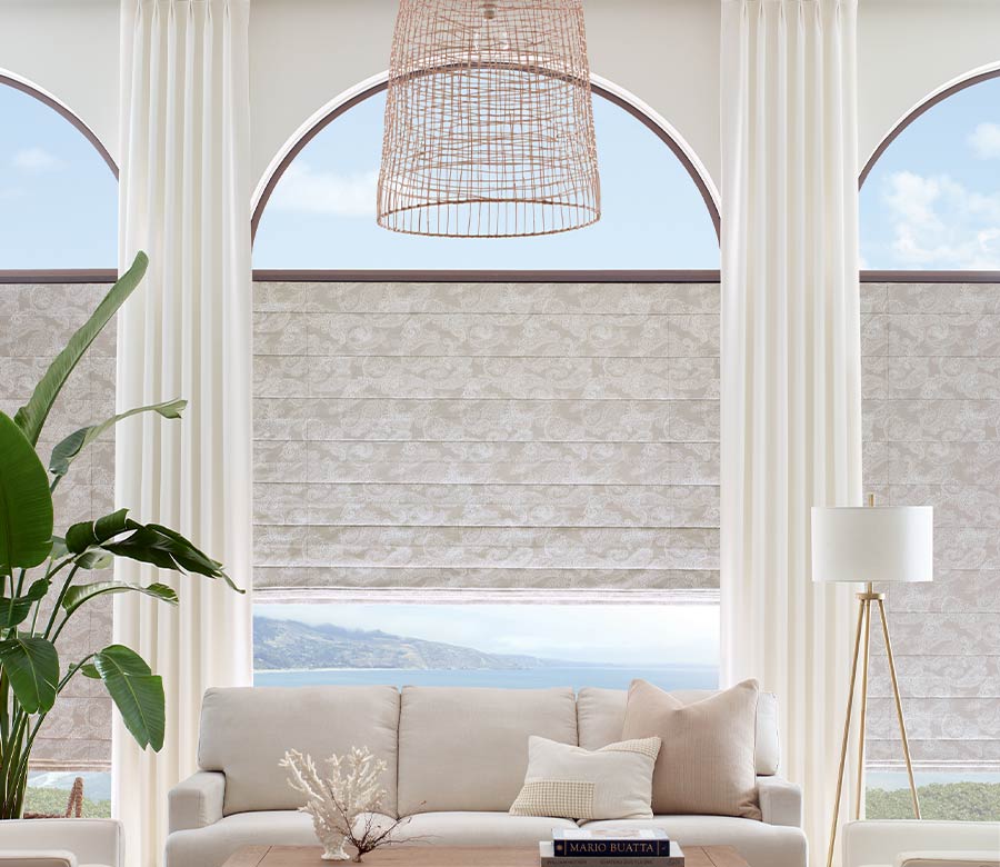 floor to ceiling arched windows in modern neutral living room Reno, NV