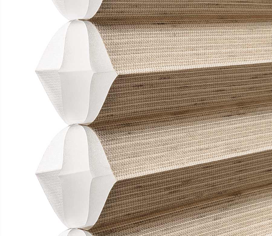 detail of beige cellular window shades