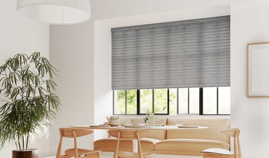 Cellular roller shades in breakfast nook