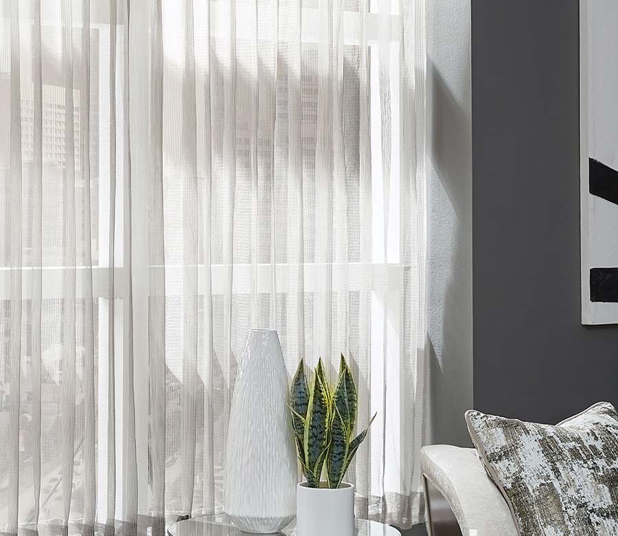 sheer curtains with light coming through for modern living room