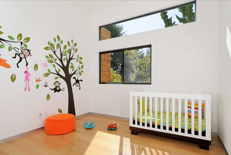 children nursery with wall decal