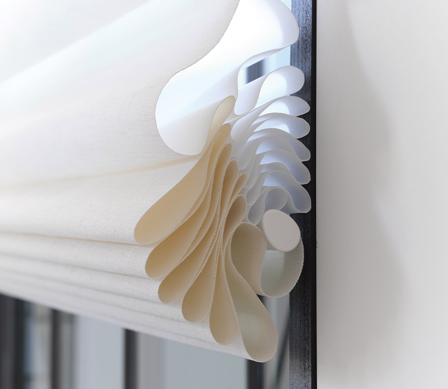 vignette-stacking-detail-roman-shades-hunter-douglas-blue-sky-shutters-and-shades Soft fabric Roman shades with light control