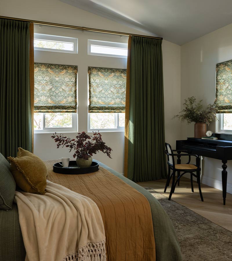 energy-efficient-custom-roman-shades-window-treatments-blue-sky-shutters-and-shades green drapery with roman shades in bedroom energy efficient
