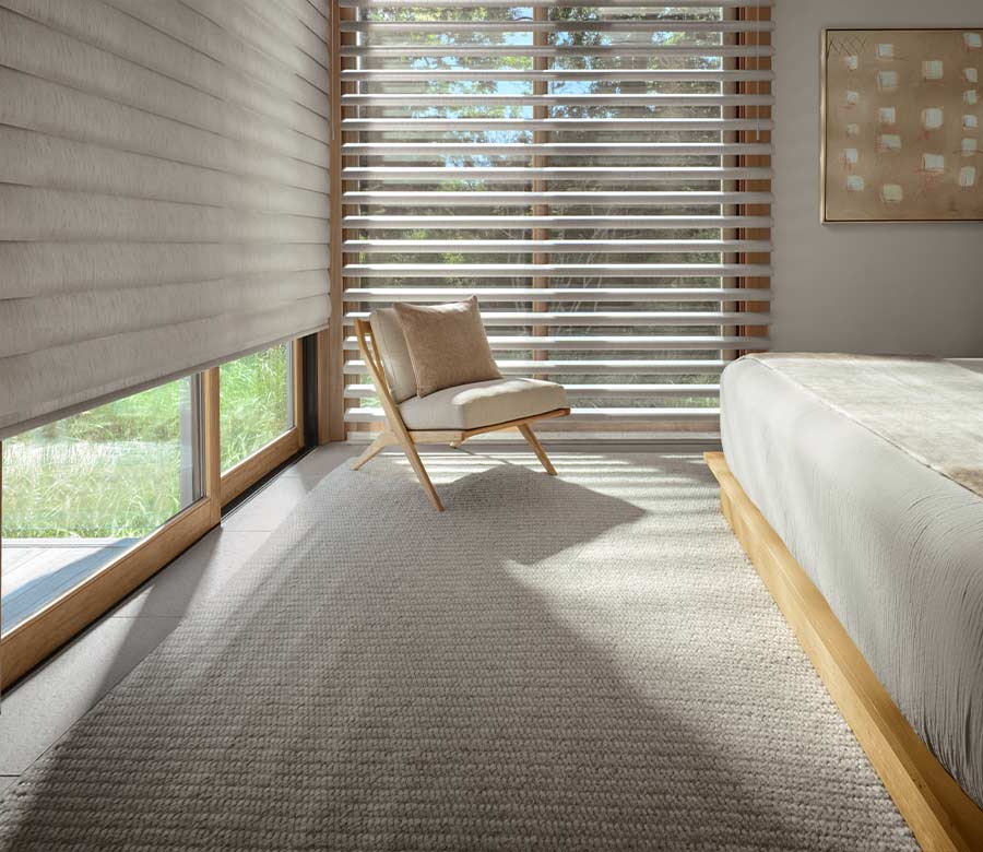 master bedroom with beige pirouette shades with closed and open vanes