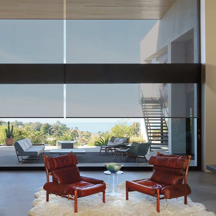 light filtering solar shades in Reno NV on floor to ceiling living room windows for reduced glare and increased outdoor views
