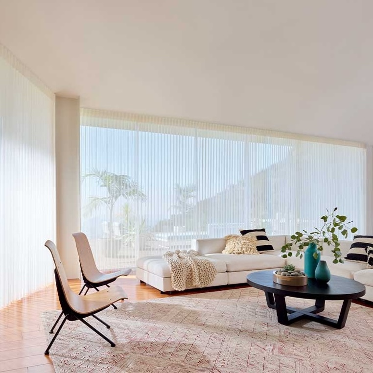 Luminette Privacy Sheers for flexible light control and privacy adjustments on wall to wall windows