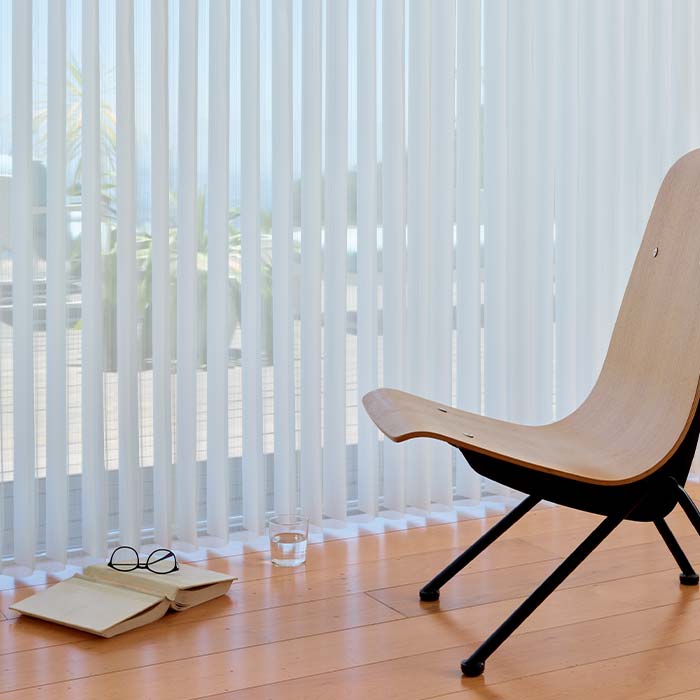 Luminette privacy sheers covering sliding glass doors in modern Reno living room